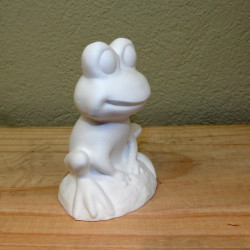 Fröhlicher Frosch auf Stein